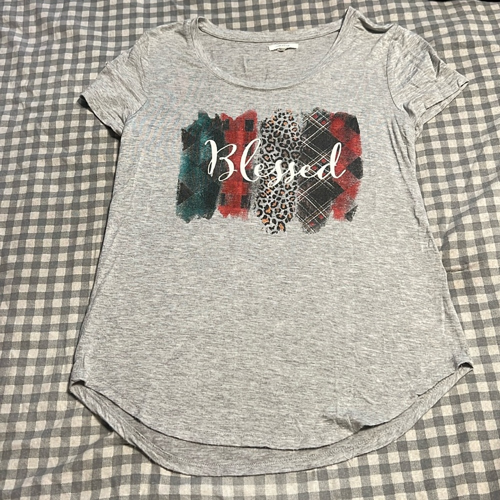Maurice’s tee shirt
